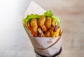 Greek gyros with Fried Shrimp, tzatziki sauce, vegetables Royalty Free Stock Photo