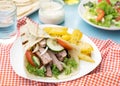 Greek gyros with pork, vegetables and homemade pita bread