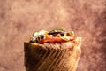 Greek gyros wrapped in pita breads with vegetables and sauce. traditional American food. fast food Royalty Free Stock Photo