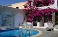 Greek Home With Swimming Pool and Colorful Flowers Royalty Free Stock Photo