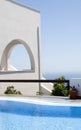 Greek island architecture with pool and sea view Royalty Free Stock Photo