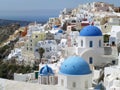 Greek Islands Style White and Blue Colored Churches at Oia Village, Santorini Royalty Free Stock Photo