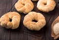 Greek koulouri or Turkish bagels called Simit in stack. Traditional street food, crispy sesame bread ring bagels Royalty Free Stock Photo