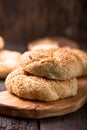 Greek koulouri or Turkish bagels called Simit in stack. Traditional street food, crispy sesame bread ring bagels Royalty Free Stock Photo