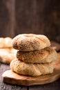 Greek koulouri or Turkish bagels called Simit in stack. Traditional street food, crispy sesame bread ring bagels Royalty Free Stock Photo