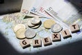 Greek map, euros and drachma grexit letters Royalty Free Stock Photo