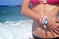 Greek model advertises jewelry at the beach