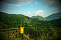 Greek Mountain Landscape With Yellow Trash can Royalty Free Stock Photo