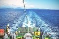 The Greek national flag flying from the stern of a ferry boat Royalty Free Stock Photo