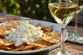 Feta cheese, Pita chips and a Assyrtiko wine