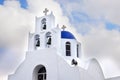 Greek orthodox church domes against the blue sky background and white clouds Royalty Free Stock Photo