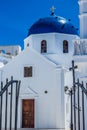 Greek Orthodox Church entrance and blue dome, taken on the island of Santorini Royalty Free Stock Photo