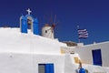 Greek Orthodox Church and Traditional Windmill, Oia, Santorini, Greece Royalty Free Stock Photo