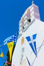 Greek othodox church drcorated by flags in celebration Royalty Free Stock Photo