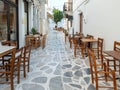 Greek outdoors traditional tavern restaurant at Tinos island, Chora town, Cyclades Greece