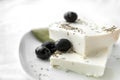 Greek pickled feta cheese, black olives Royalty Free Stock Photo