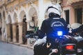 Greek police squad formation on duty riding bike and motorcycle and maintain public order in the streets of Kerkyra, Corfu, Greece