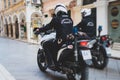 Greek police squad formation on duty riding bike and motorcycle and maintain public order in the streets of Kerkyra, Corfu, Greece