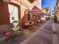 Greek restaurant in shaded alley