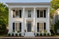 greek revival home with symmetrical rectangular windows