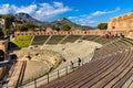 Greek and Roman Teatro antico Ancient Theatre with cavea auditorium in Taormina at Ioanian sea shore of Sicily in Italy