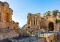 Greek and Roman Teatro antico Ancient Theatre with stage and arches colonnade in Taormina of Sicily in Italy Royalty Free Stock Photo