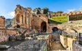 Greek and Roman Teatro antico Ancient Theatre with stage and arches colonnade in Taormina of Sicily in Italy Royalty Free Stock Photo