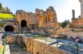 Greek and Roman Teatro antico Ancient Theatre with stage and arches colonnade in Taormina of Sicily in Italy Royalty Free Stock Photo
