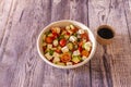 Greek salad with all the ingredients diced. Avocado, cucumbers, green and red peppers, feta cheese Royalty Free Stock Photo