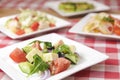 Greek salad with cheese, juicy tomatoes, red pepper, red onion, cucumber and lettuce Royalty Free Stock Photo