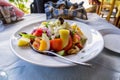 Greek salad on Crete island with egges and potato. Crete island, Greece Royalty Free Stock Photo