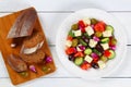 Greek salad with crusty country bread Royalty Free Stock Photo