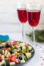 Greek salad. Diced tomatoes, cucumbers, feta cheese, olives.