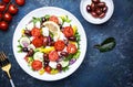 Greek salad with feta cheese, kalamata olives, red tomato, yellow paprika, cucumber and red onion, healthy mediterranean diet food