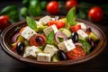 Greek salad with feta cheese, olives, tomato and basil. Close up