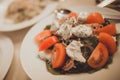 Greek salad with feta cheese, organic kalamata olives, juicy tomatoes, red pepper, red onion, cucumber and lettuce. Royalty Free Stock Photo