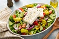 Greek salad with feta on a large platter