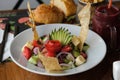 Greek salad of fresh cucumber, tomato, sweet pepper, red onion, feta cheese and olives with olive oil. Healthy food, top view Royalty Free Stock Photo