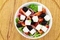 Greek salad with fresh vegetables, feta cheese and black olives Royalty Free Stock Photo