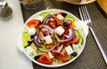 Greek salad with fresh vegetables, feta cheese and black olives Royalty Free Stock Photo