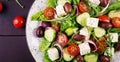 Greek salad with fresh vegetables, feta cheese and kalamata olives. Royalty Free Stock Photo