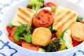 Greek salad with grilled halloumi Royalty Free Stock Photo