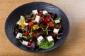 Greek salad or horiatiki salad is a salad in Greek cuisine. Greek salad is made with tomatoes Royalty Free Stock Photo