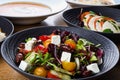 Greek salad or horiatiki salad is a salad in Greek cuisine. Greek salad is made with tomatoes Royalty Free Stock Photo