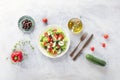 Greek salad with ingredients. A plate of fresh salad with lettuce, feta cheese, tomatoes etc