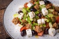 Greek salad on dark wooden Royalty Free Stock Photo