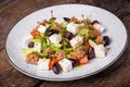 Greek salad on dark wooden Royalty Free Stock Photo