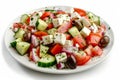 Greek Salad in Light Plate Isolated, Villages Salad or Horiatiki with Tomatoes, Diced Cucumbers, Onion Royalty Free Stock Photo