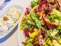 Greek salad with mixed fried and grilled sea food Royalty Free Stock Photo