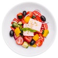 Greek salad of organic vegetables with tomatoes, cucumber, red onion, olives Royalty Free Stock Photo